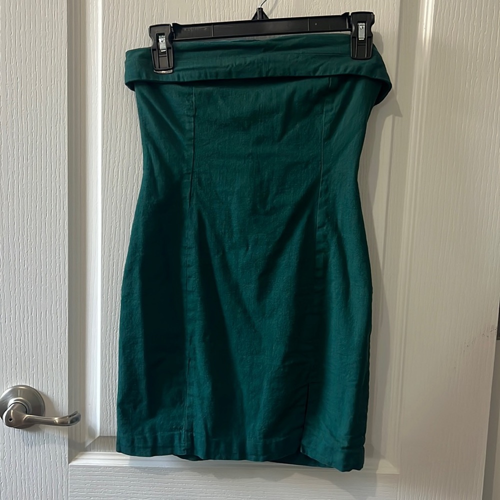 Dark Green Strapless Dress. Has slit in front left leg. Sticky top.